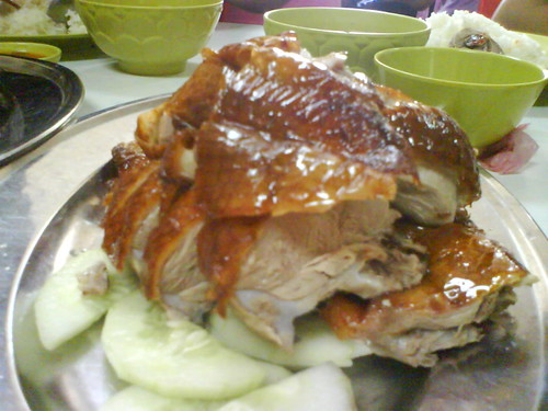 Extra roast duck skin served at the table