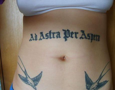 Latin tattoo reading “To the stars through adversity”