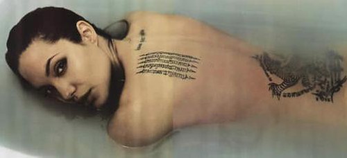 Close-up of the Khmer-script Pali incantation tattoo