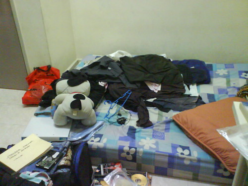 Room filled with belongings while packing