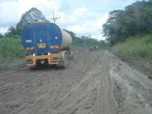 Vehicle stuck on the muddy Miri-Lapok road