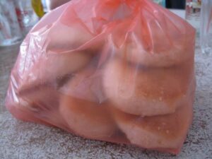 Large plastic bag of kompia
